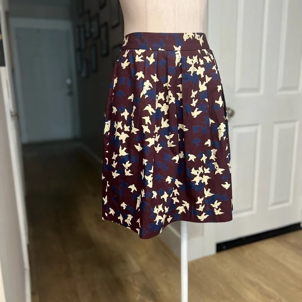 CUE Australia burgundy flock of birds short skirt
